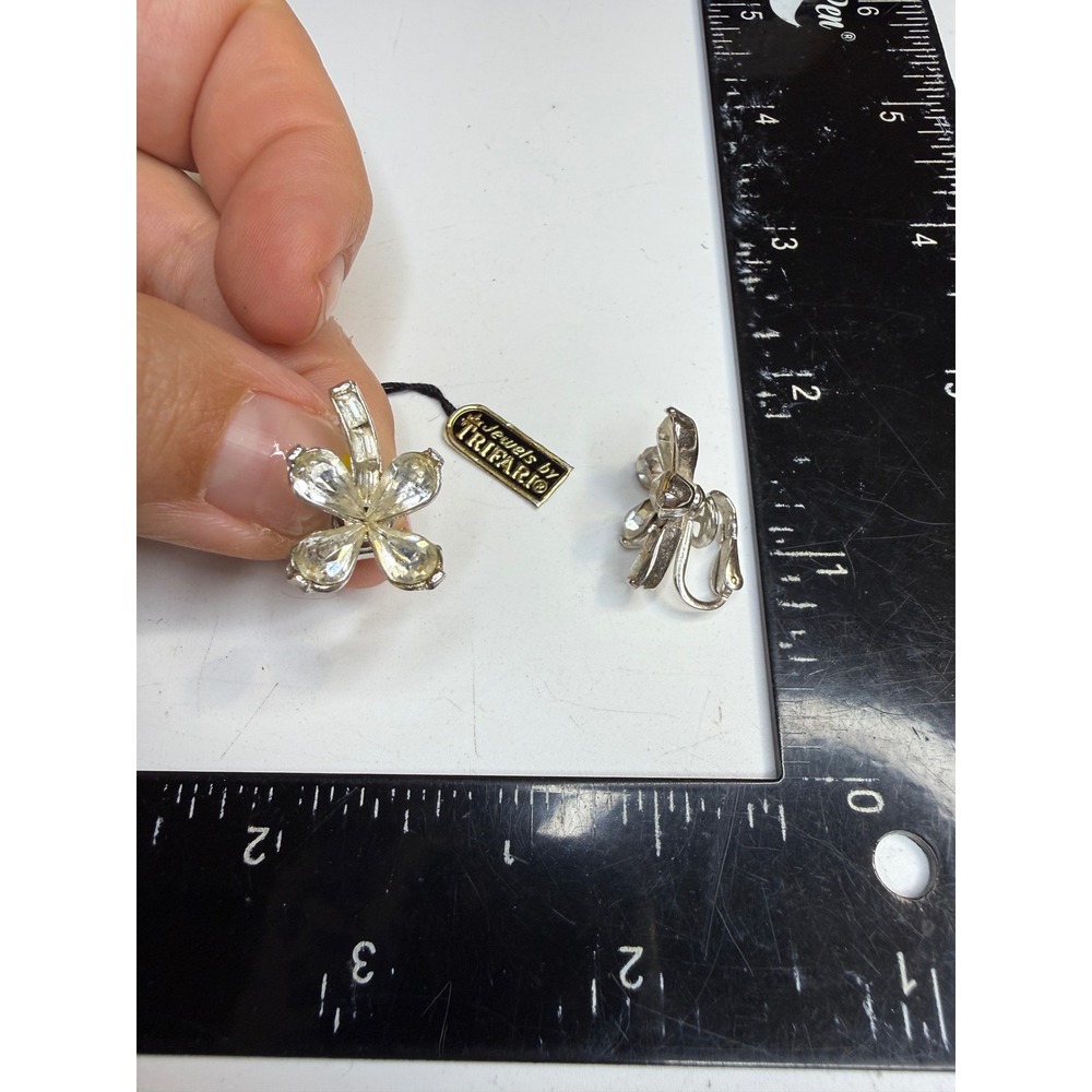 Jewels by Trifari Silver Tone Clear Rhinestone Flower Clip On Earrings Pat Pend